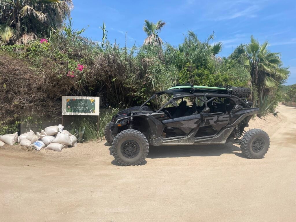 Alt: Guests departing Acre Restaurant in a Can-Am Maverick X3 for an East Cape off-road tour, San José del Cabo