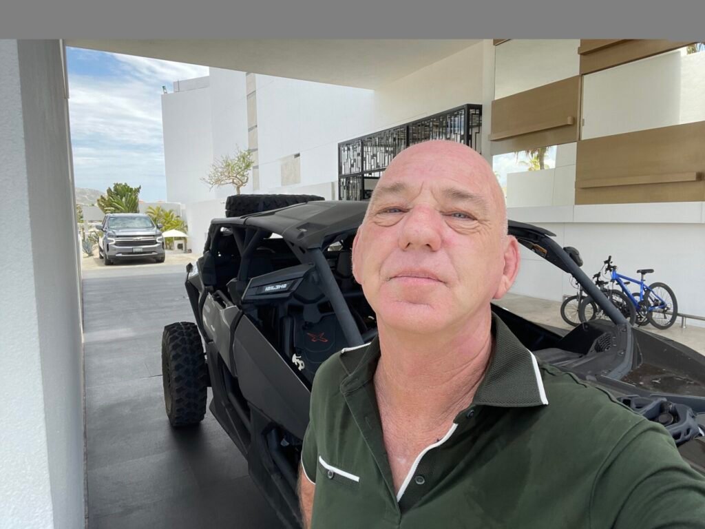 Benjamin Pride, owner of Take The Wheel Baja, with Can-Am Maverick X3 at luxury resort in Los Cabos